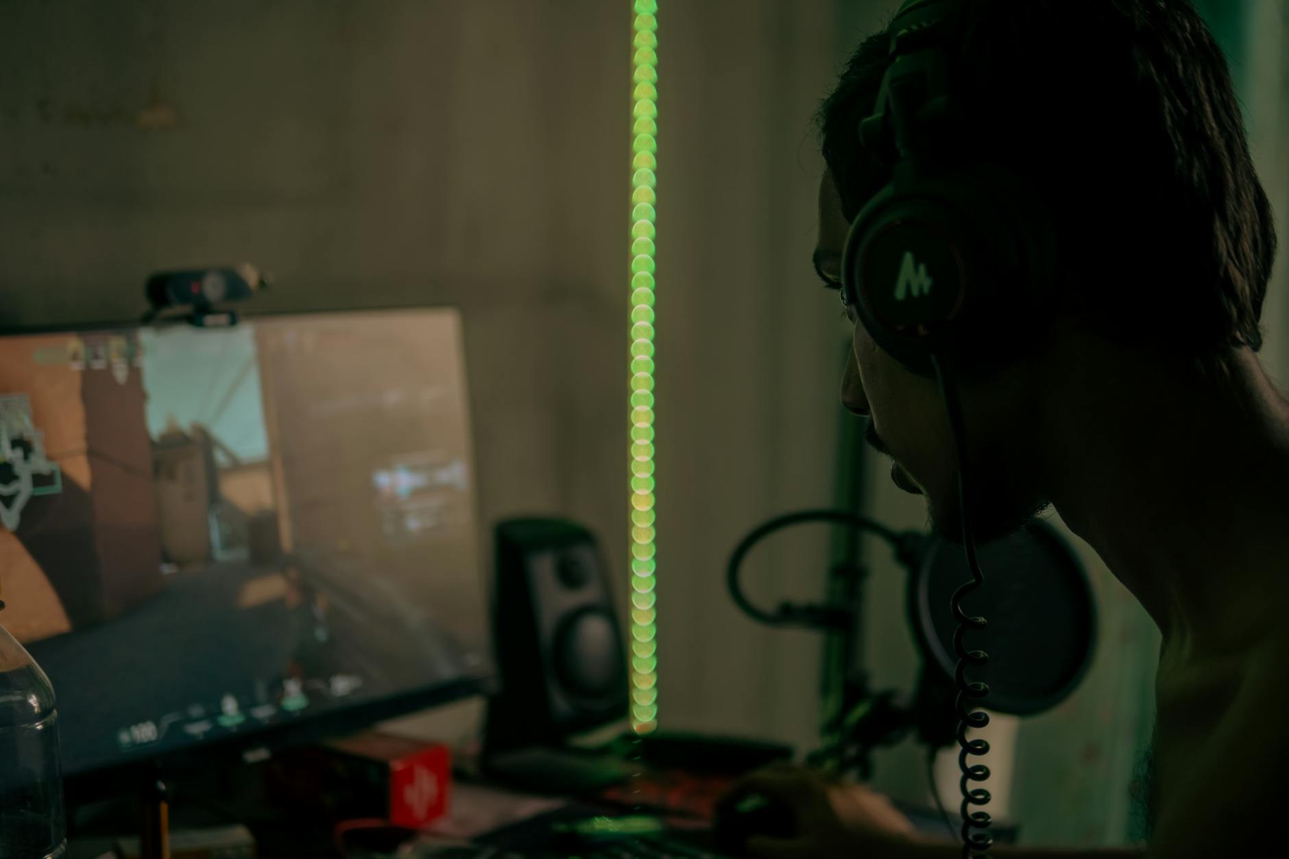 Developer presenting playable game build at demo station